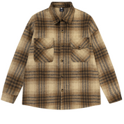 Plaid shirt with two front pockets on a white background