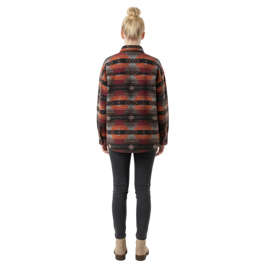 Person wearing a patterned shirt on a white background